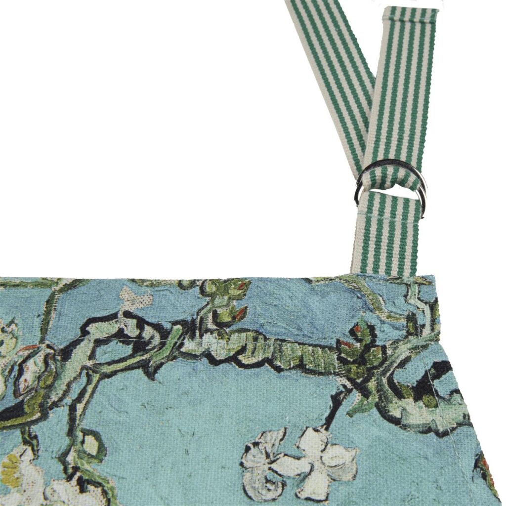 Het Van Gogh Blossom-schort in blauw heeft een groen-wit bloemenpatroon op een lichtblauwe achtergrond, met een gestreepte band en een metalen ring.