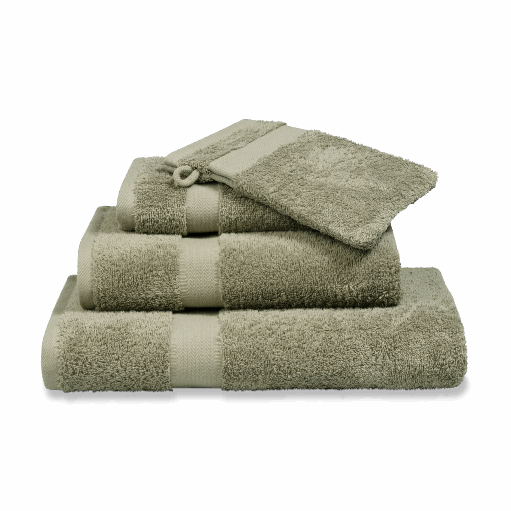 De Vandyck Prestige-washandset bestaat uit zes rookgroene washandjes met een zachte textuur en bijpassende bandjes.